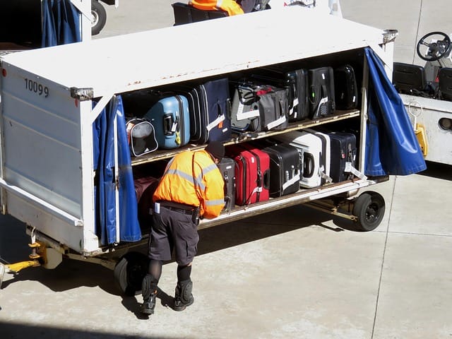 baggage, travel, luggage, trip, journey, suitcase, transport, holiday, vacation, departure, flight, airport, airline, traveler, work, handler, ground crew, baggage, baggage, baggage, baggage, baggage, luggage, luggage, luggage, airport, airport, ground crew